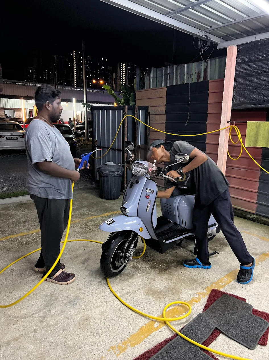 Scooter washing service at Jom Lepak Car Wash